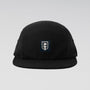 A black five-panel camp cap with a small rectangular embroidered patch on the front featuring a white flame and the word 'SUNRISE' on a dark navy background, set against a light gray gradient studio background.