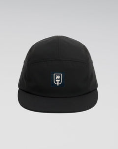 Black cap with a logo on a light gray background
