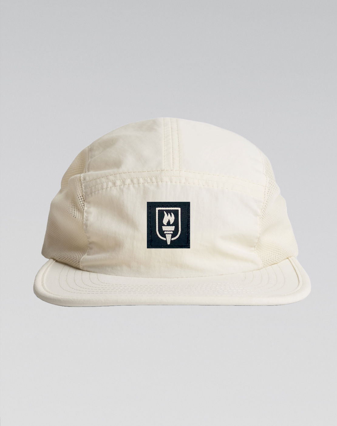 Beige cap with a logo on a light gray background