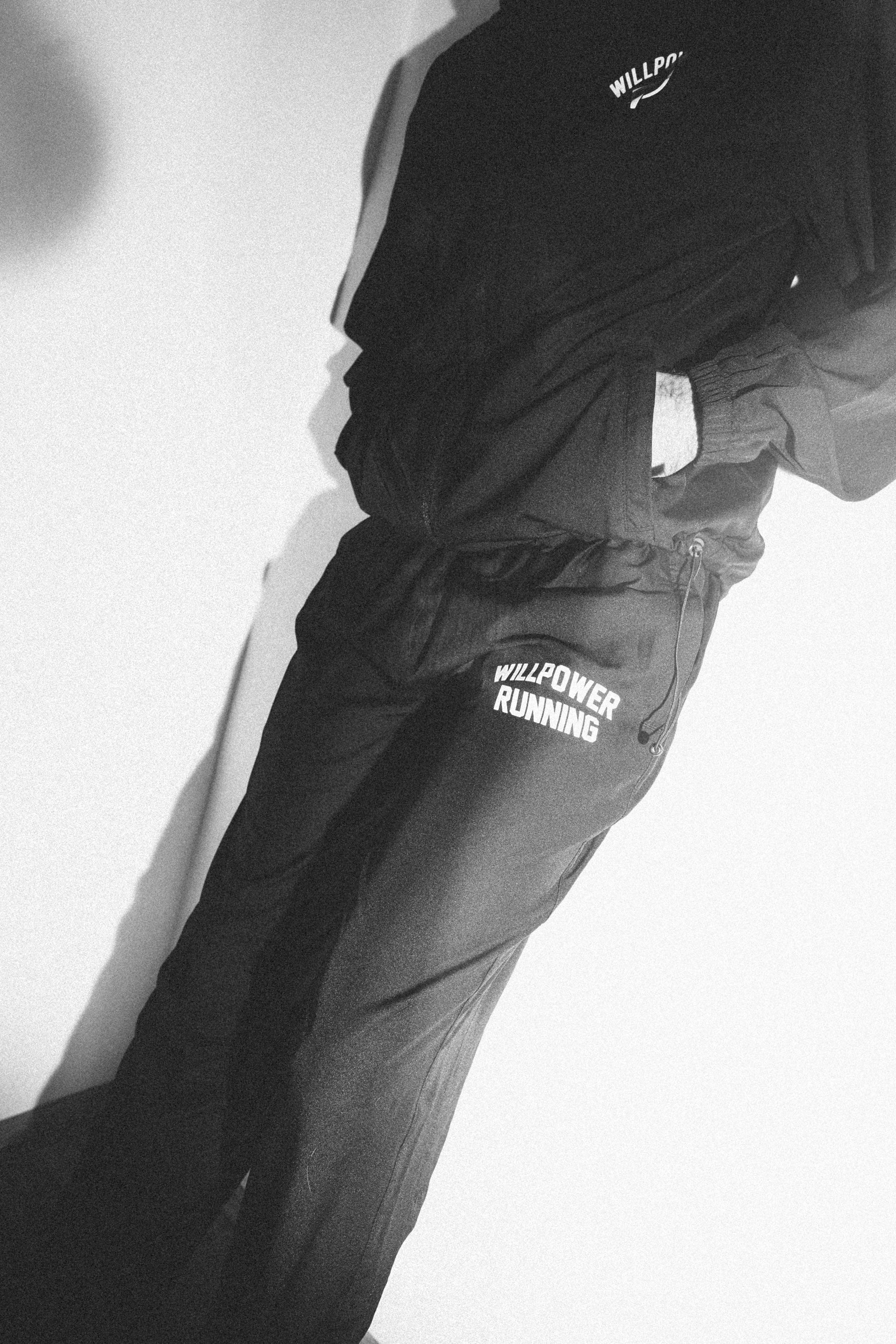 Black athletic pants with 'WILLOW' branding on a white background